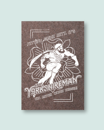 White  & Brown Print of The Yorkshireman on a Light Blue Background